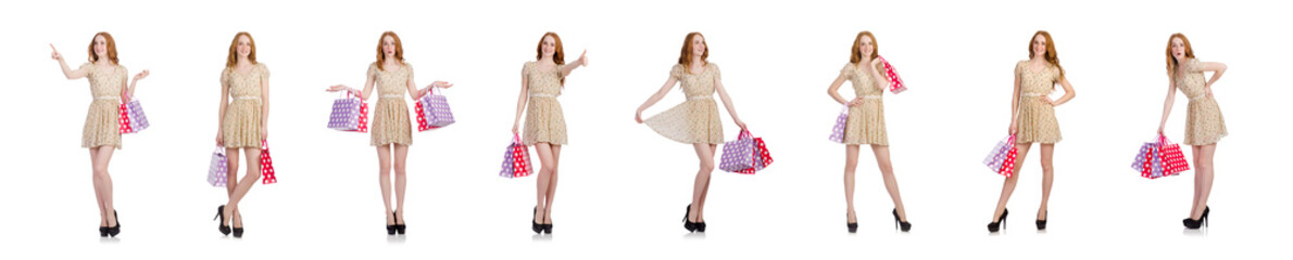 Naklejka premium Woman with shopping bags isolated on white