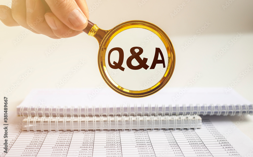 Poster questions and answers concept - q and a - magnifying glass, notebook on table