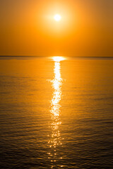 Beautiful sunrise over the horizon in the sea