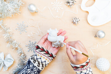 How to make a bull, a symbol of the new year. Children art project. DIY concept. Step by step photo instruction. Step 2 apply with a brush, the main color is white metallic