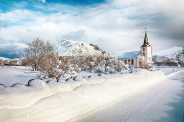 Splendid snowy winter scene of  Valberg church on Lofoten Islands.
