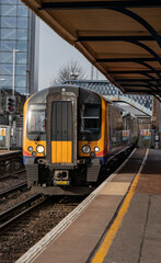 Fototapeta premium a train arriving at a train station or platform