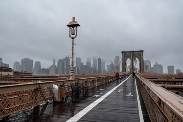 Brooklyn Bridge at rainy day in New York. USA