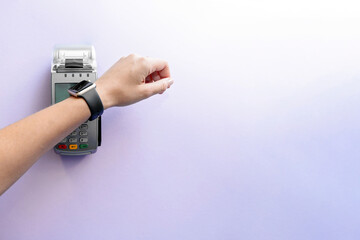 Top view of contactless payment with smart watch. Technology of paypass.