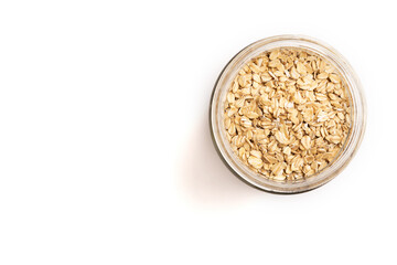 Jar of oat flakes isolated on white background