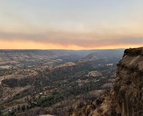 Fototapeta na wymiar California Fires Smoky sunrise over the mountains