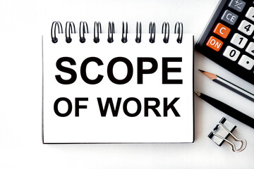 scope of work text on white paper on light background