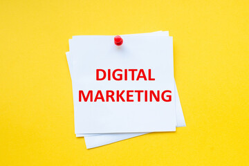 Digital marketing. Word on white sticker with yellow background