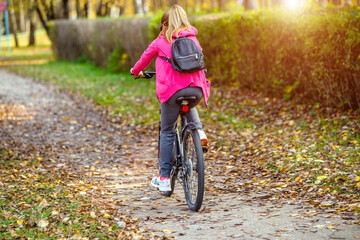 Cyclist ride on the bike path in the city Park