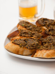 Tapenade on baguette slices
