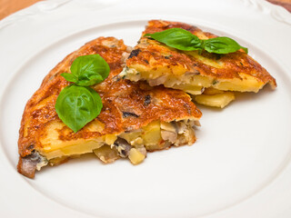 Spanish tortilla with mushrooms and basil