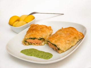 Salmon in puff pastry with potatoes