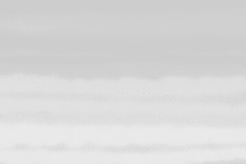 Obraz premium White spray paint ink texture. Graffiti painting on the wall. Street art and vandalism. Digitally airbrushed paper background.