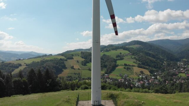 lifting in front of a running wind turbine