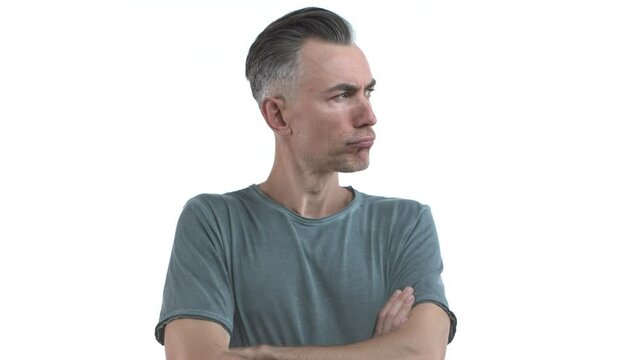 Handsome middle-aged man with grey hair and bristle, react to someone talking, looking thoughtful, cross hands on chest and thinking, pondering while standing over white background
