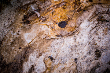 Vignetting of the structure of the surface of the Stone. The idea for texture background. Natural rocks closeup shot.