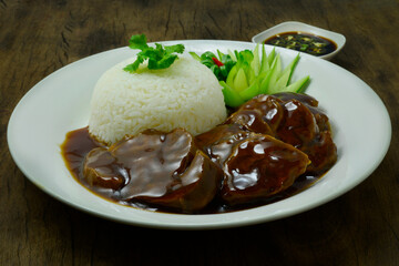 Stewed Beef Shanks with brown sauce Served Rice recipe decorate carved cucumber