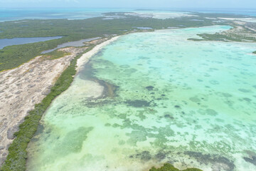 Fototapeta na wymiar Aerial Landscape Caribbean island with shore coast of various shades of blue in Los Roques, National Park