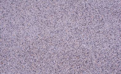 Natural color sand wash surface floor made of small sand stone. Image for background texture.