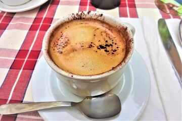 Cup of coffee from Rome city