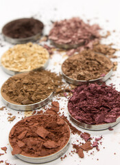 Colorful crushed Eyeshadow on a White background