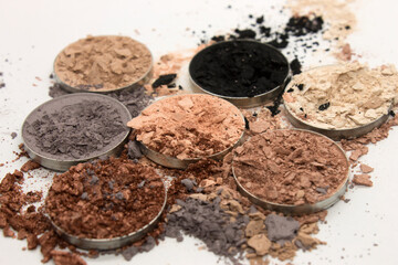 Colorful crushed Eyeshadow on a White background
