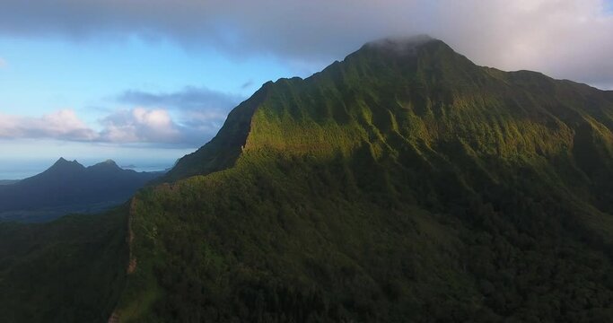 Ho'omaluhia botanical garden mountain in Hawaii, wide aerial