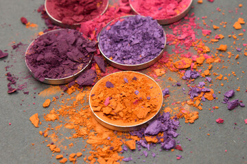 Orange,Pink,Purple,Lilac and Red crushed Eyeshadow on a Black background