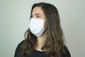 Women with face mask for protection against Corona virus