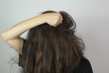 Naklejka premium angry woman with frizzy long hair