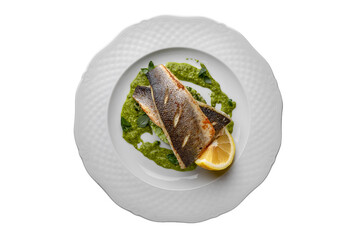 Grilled seabass fillet on couscous with broccoli and zucchini with pesto sauce.  Delicious seafood platter. Useful, dietary. Isolated on a white background.