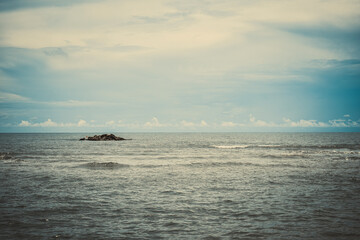 Rocks in the sea, vintage style decoration for background work.