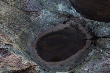 close up of hole by the river