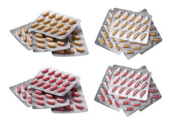 Obraz premium Set of multicolored pills isolated on white background