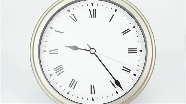 Nine o'clock classic Face With Roman Numerals, Time lapse 60 minutes.