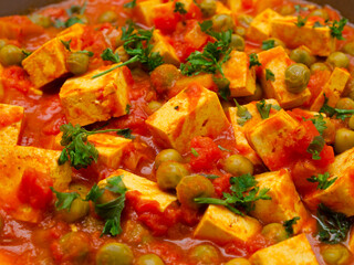 Vegan tofu and green peas curry