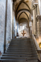 Fototapeta premium AREZZO, ITALY - OCTOBER 10, 2018: Strict and bright interior of the medieval church Santa Maria della Pieve in Arezzo, Tuscany, Italy