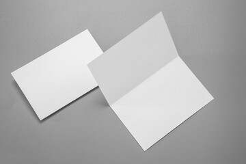 Blank portrait mock-up paper. brochure magazine isolated on gray, changeable background / white...