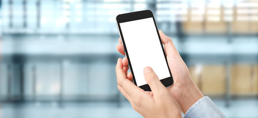 Hand holding smartphone device  touching screen