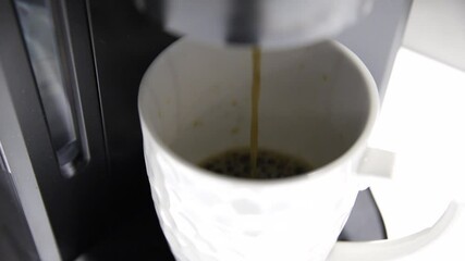 Coffee brewing in slow motion with cinematic video