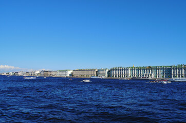 St. Petersburg view from the Neva River to the Winter Palace and embankment, along the coast moored tour boats