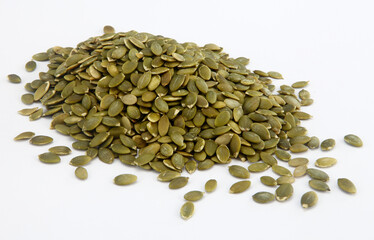 pumpkin seeds on white background.