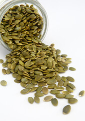 pumpkin seeds on white background.