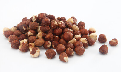 hazelnuts on white background