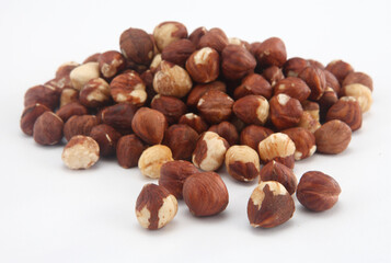 hazelnuts on white background