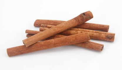 cinnamon sticks isolated on white