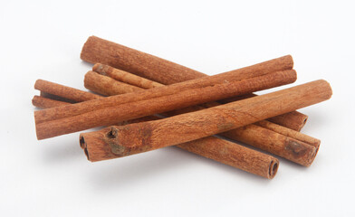 cinnamon sticks isolated on white