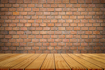 Wooden tabletop template mockup for display merchandise. wooden shelf table isolated on orange brick wall background.