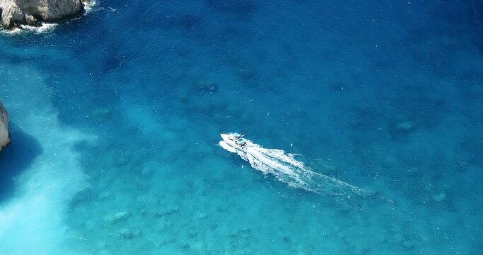 Tourist pleasure boats on island hopping trip in blue sea water. Top view