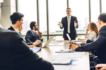 Group of professional business meeting and discussing strategy with new startup project.Creative business people planning and brainstorm with laptop computer in modern office.Teamwork concept